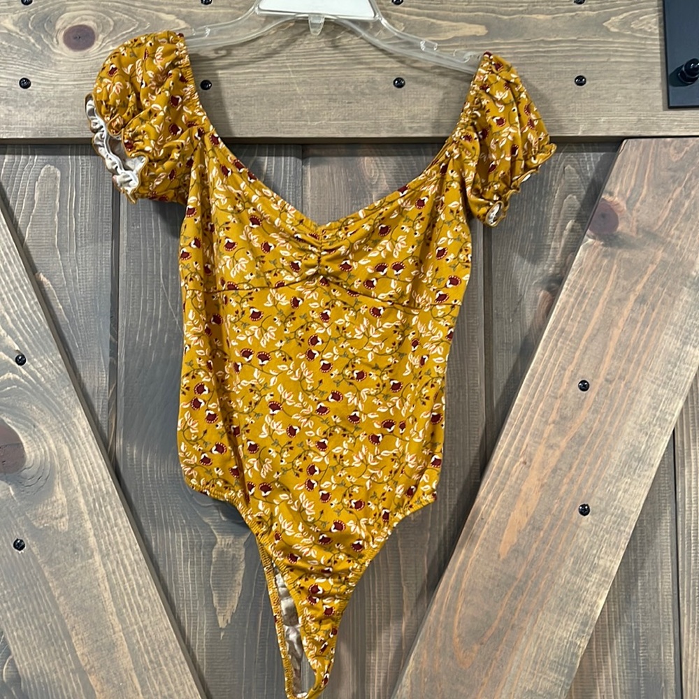 Off the shoulder body suit